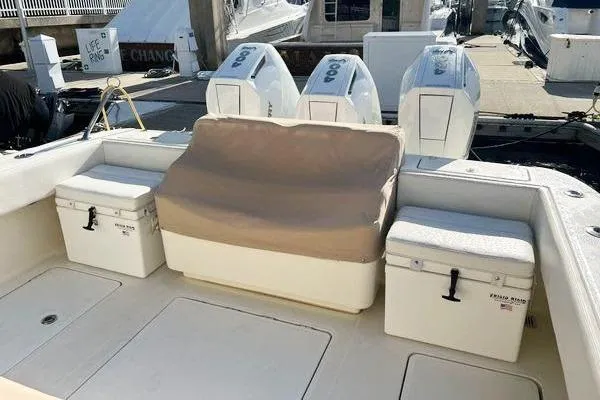 Gyn Tonic Yacht Photos Pics 2018 Hydra-Sports 3000 CC boat deck with seating and storage coolers.