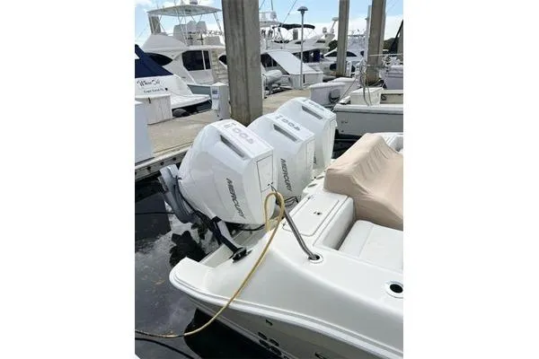 Gyn Tonic Yacht Photos Pics 2018 Hydra-Sports 3000 CC boat with twin Mercury outboard engines docked at marina.