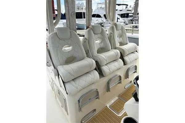 Gyn Tonic Yacht Photos Pics 2018 Hydra-Sports 3000 CC boat with luxurious white leather seating.