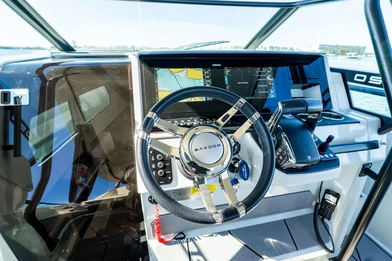  Yacht Photos Pics 2024 Saxdor 320 GTO helm with modern navigation and control systems.