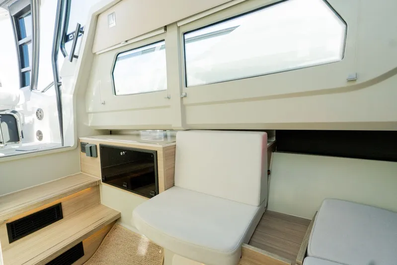  Yacht Photos Pics 2024 Saxdor 320 GTO interior with modern seating and sleek design elements.