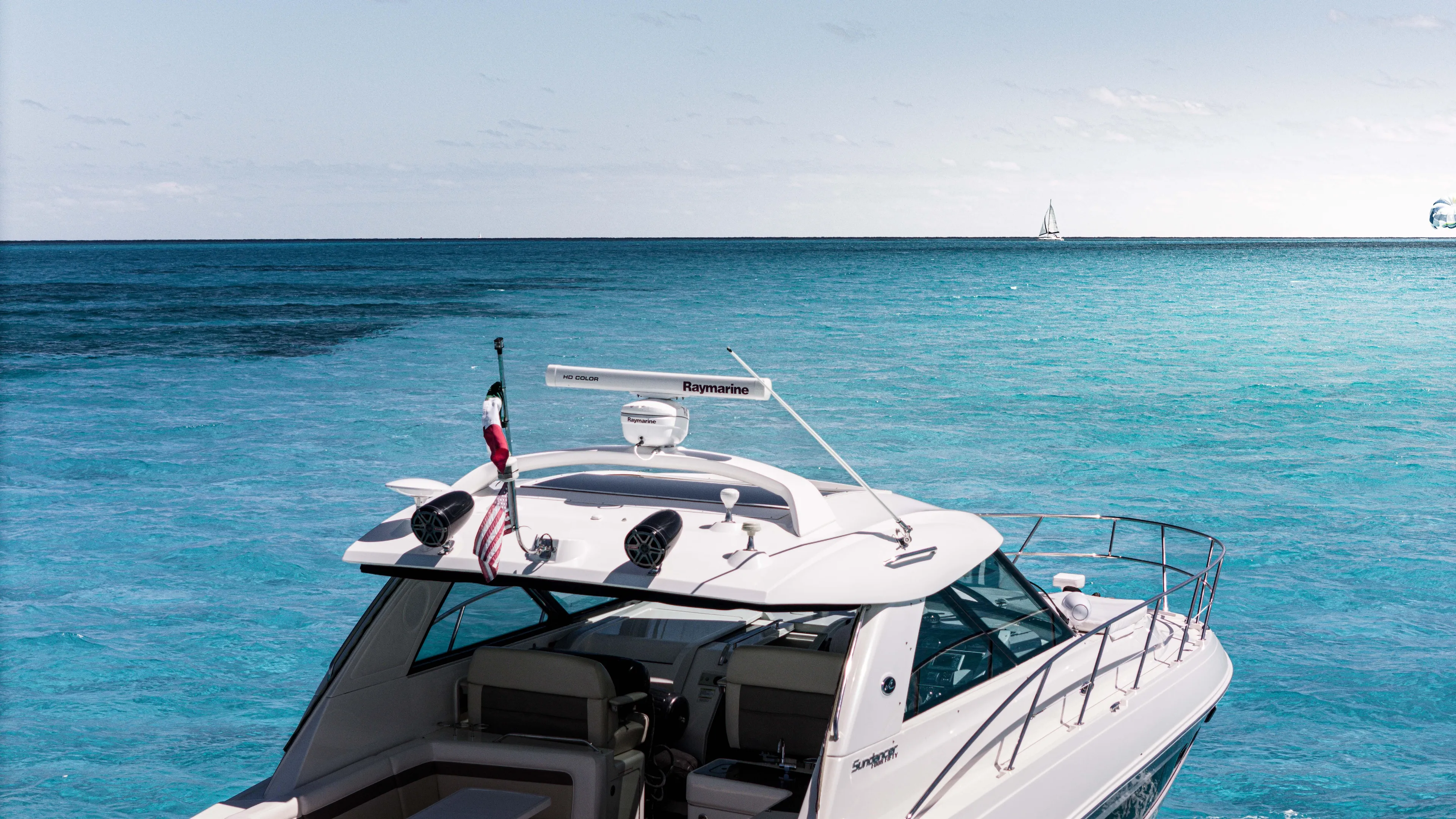 Atm 2013 Sea Ray 450 Sundancer @ Cancun Yacht Photos Pics Sea Ray 450 Sundancer 2013 yacht on clear blue ocean waters.