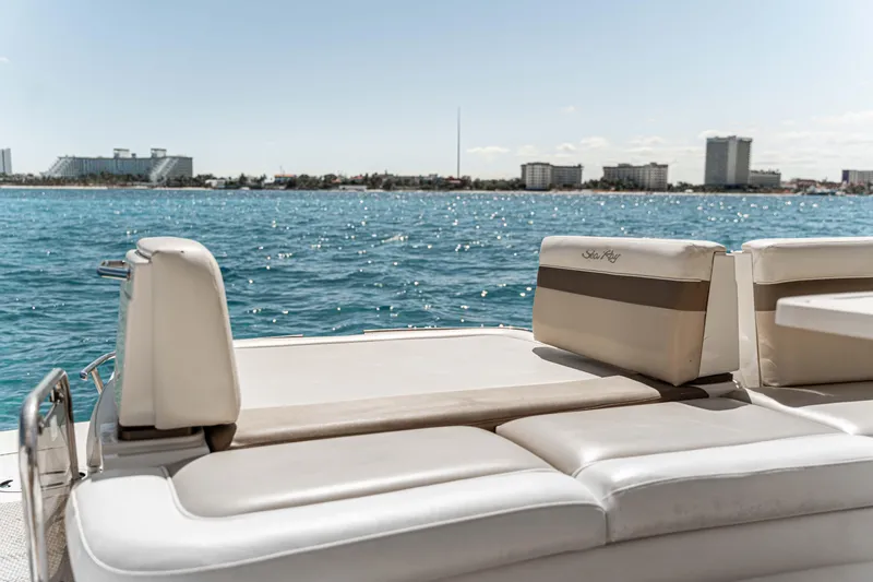 Atm 2013 Sea Ray 450 Sundancer @ Cancun Yacht Photos Pics 2013 Sea Ray 450 Sundancer yacht with luxurious seating, ocean view, and city skyline in the background.