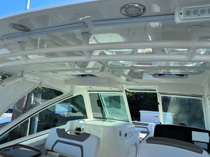  Yacht Photos Pics 2019 World Cat 320 DC boat interior with modern seating and sleek design.