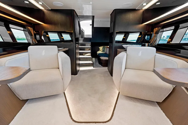 Libertas One Yacht Photos Pics Luxurious interior of 2021 Sichterman Libertas 54 yacht with plush seating and modern design.