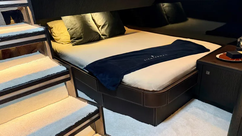 Libertas One Yacht Photos Pics Luxurious bedroom interior of 2021 Sichterman Libertas 54 yacht with elegant bedding.