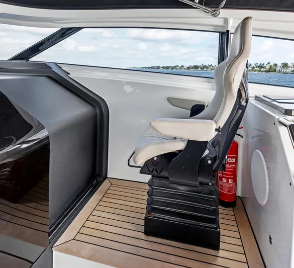 Libertas One Yacht Photos Pics Luxury helm seat on 2021 Sichterman Libertas 54 yacht, featuring sleek design and modern interior.