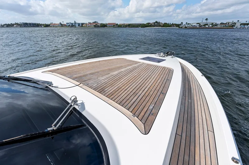 Libertas One Yacht Photos Pics Sichterman Libertas 54 yacht, 2021 model, featuring sleek wooden deck on open water.