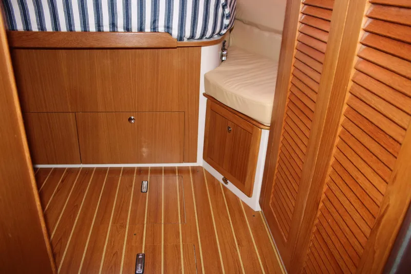 Hannah Yacht Photos Pics Interior of 2011 Catalina 445 sailboat with wooden flooring and cabinetry.