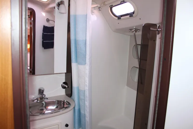 Hannah Yacht Photos Pics Bathroom interior of 2011 Catalina 445 yacht with shower and sink.