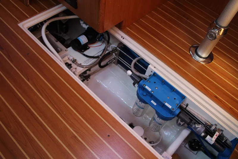 Hannah Yacht Photos Pics 2011 Catalina 445 yacht interior showing engine compartment and wooden flooring.