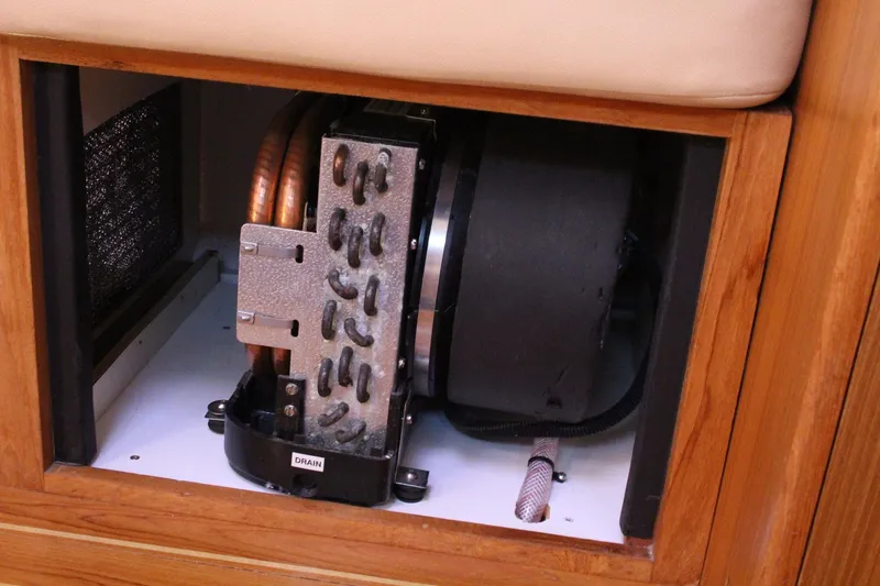 Hannah Yacht Photos Pics 2011 Catalina 445 interior component, featuring a compact mechanical system with copper coils.