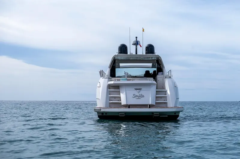  Yacht Photos Pics 2020 Filippetti S55 yacht on calm sea under cloudy sky.