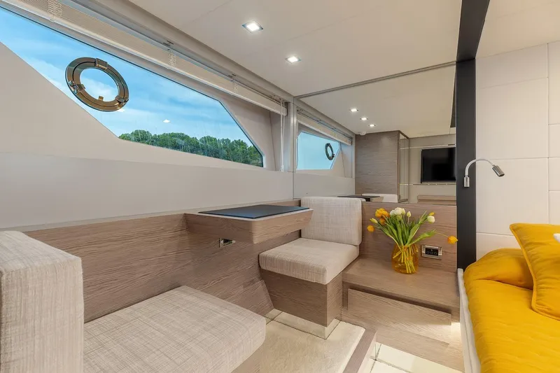  Yacht Photos Pics Luxurious interior of 2020 Filippetti S55S yacht with modern seating and decor.