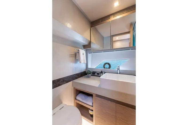  Yacht Photos Pics Luxurious bathroom interior of 2020 Filippetti S55S yacht with modern fixtures and elegant design.
