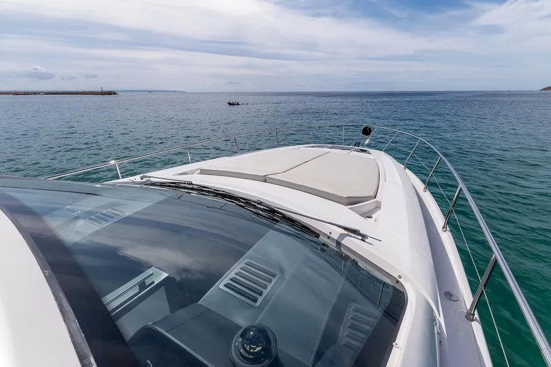  Yacht Photos Pics Luxury Filippetti S55S yacht cruising on open sea, 2020 model.