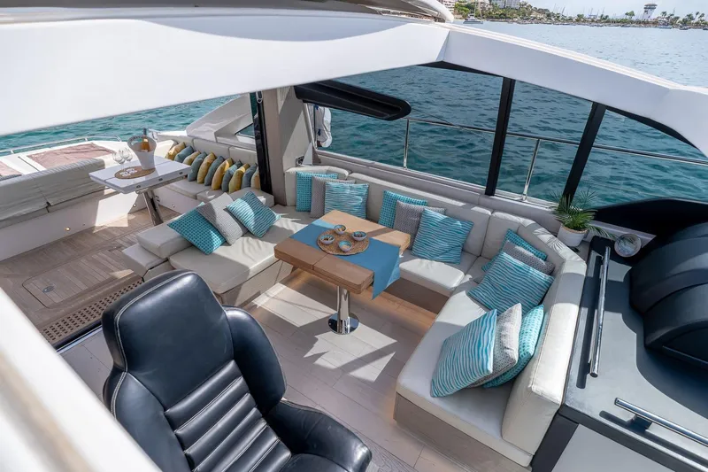  Yacht Photos Pics Luxurious 2020 Filippetti S55S yacht interior with elegant seating and ocean view.