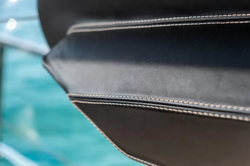  Yacht Photos Pics Close-up of 2020 Filippetti S55S yacht's leather upholstery with detailed stitching.