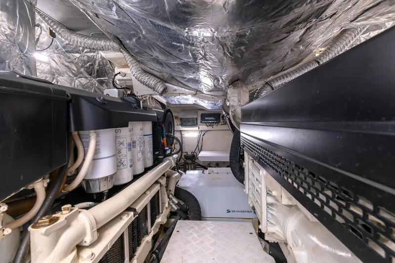  Yacht Photos Pics Engine room of 2020 Filippetti S55S yacht, showcasing mechanical components and insulation.