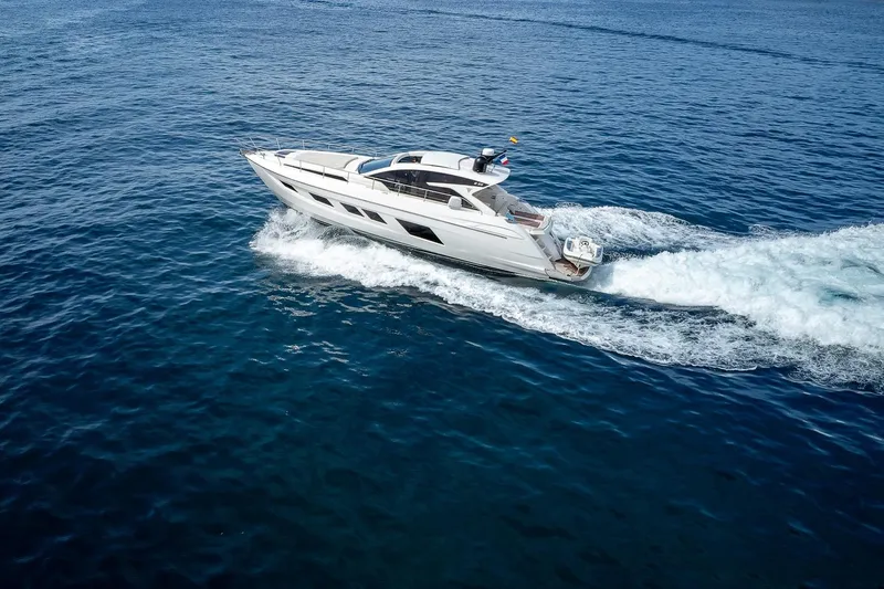  Yacht Photos Pics Luxury 2020 Filippetti S55S yacht cruising on open blue sea.