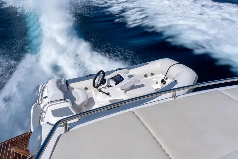  Yacht Photos Pics 2020 Filippetti S55S yacht cruising on open water, showcasing sleek design and powerful performance.