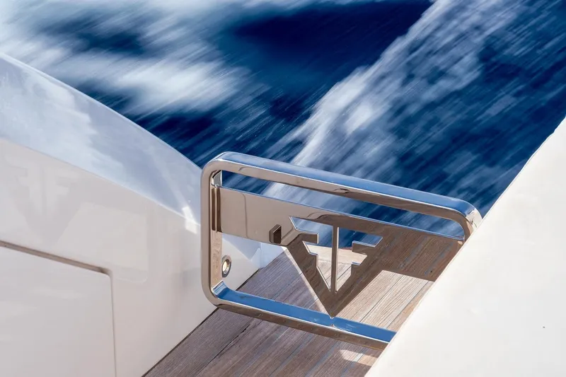  Yacht Photos Pics Filippetti S55S yacht detail, 2020 model, with sleek railing and ocean backdrop.