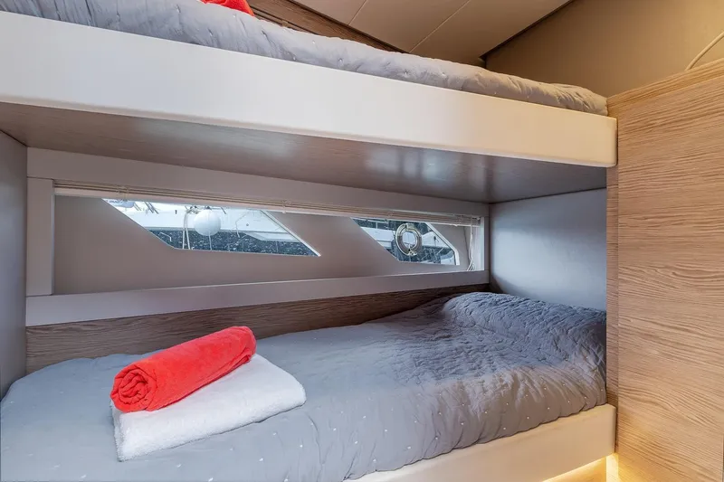  Yacht Photos Pics Bunk beds in 2020 Filippetti S55S yacht cabin with modern design and cozy bedding.