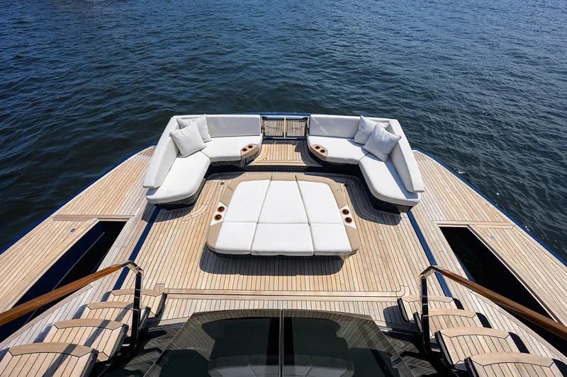 Lazzara Lsx 67 Yacht Photos Pics Luxurious 2023 Lazzara LSX 67 yacht deck with elegant seating overlooking the ocean.