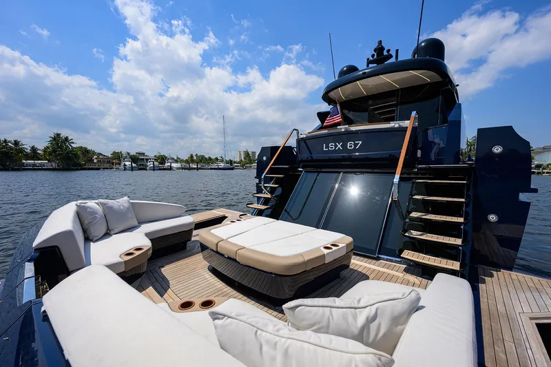 Lazzara Lsx 67 Yacht Photos Pics Luxurious 2023 Lazzara LSX 67 yacht with elegant outdoor seating and sleek design.