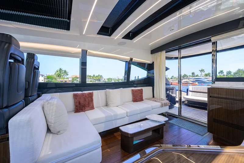Lazzara Lsx 67 Yacht Photos Pics Luxurious interior of 2023 Lazzara LSX 67 yacht with modern seating and panoramic windows.