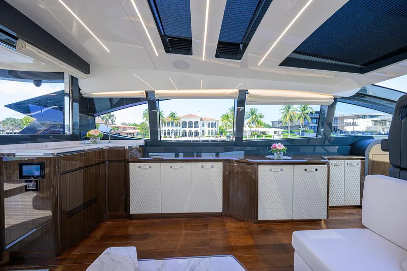 Lazzara Lsx 67 Yacht Photos Pics Luxurious interior of 2023 Lazzara LSX 67 yacht with modern design and panoramic windows.
