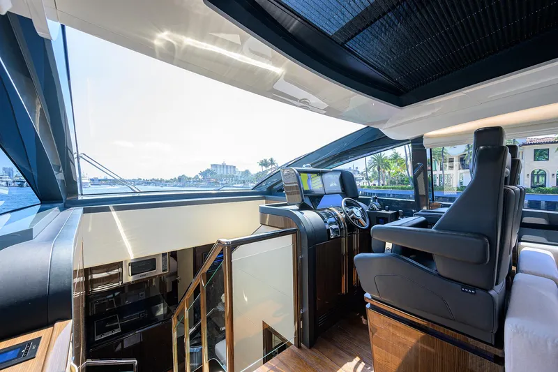 Lazzara Lsx 67 Yacht Photos Pics Luxurious interior of 2023 Lazzara LSX 67 yacht with modern helm and panoramic views.