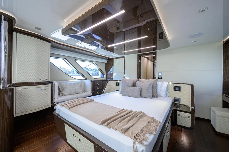 Lazzara Lsx 67 Yacht Photos Pics Luxurious bedroom interior of 2023 Lazzara LSX 67 yacht with modern design and elegant furnishings.