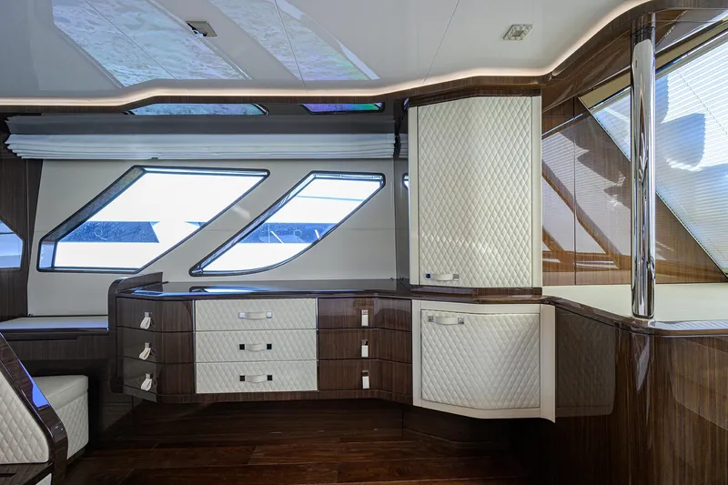 Lazzara Lsx 67 Yacht Photos Pics Luxurious interior of 2023 Lazzara LSX 67 yacht with modern cabinetry and sleek windows.