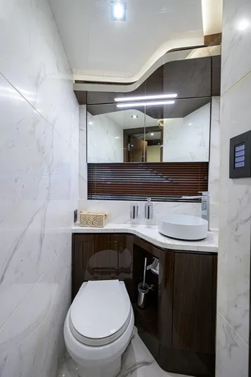 Lazzara Lsx 67 Yacht Photos Pics Luxurious bathroom in 2023 Lazzara LSX 67 yacht with modern fixtures and elegant design.