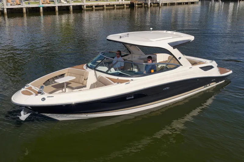  Yacht Photos Pics 2016 Sea Ray 350 SLX luxury boat cruising on calm waters.