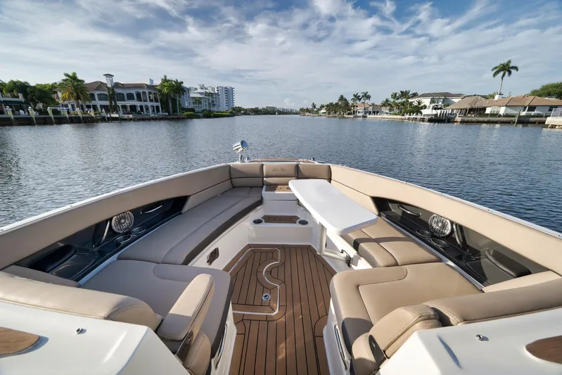 Yacht Photos Pics 2016 Sea Ray 350 SLX boat interior with luxurious seating and scenic waterfront view.