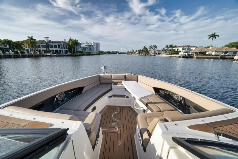  Yacht Photos Pics Luxurious 2016 Sea Ray 350 SLX boat with spacious seating on a scenic waterway.