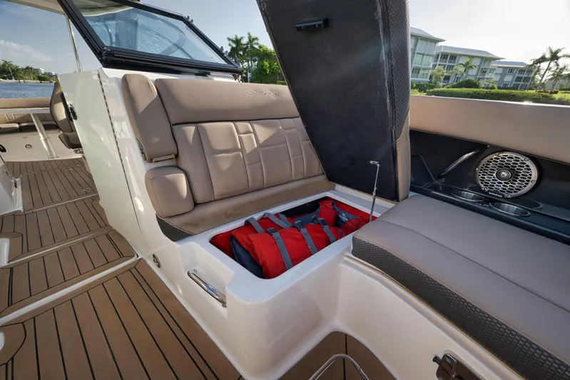  Yacht Photos Pics 2016 Sea Ray 350 SLX boat interior with open storage compartment and seating.