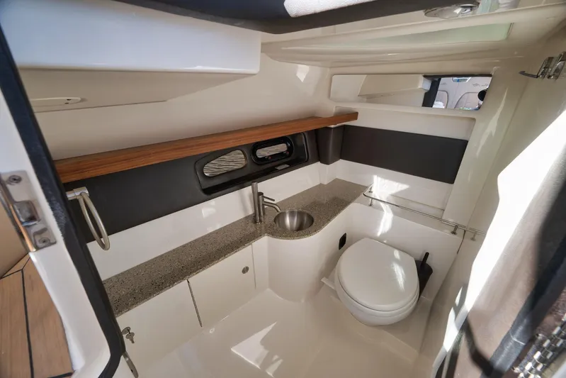  Yacht Photos Pics Luxurious 2016 Sea Ray 350 SLX boat bathroom with modern fixtures and elegant design.