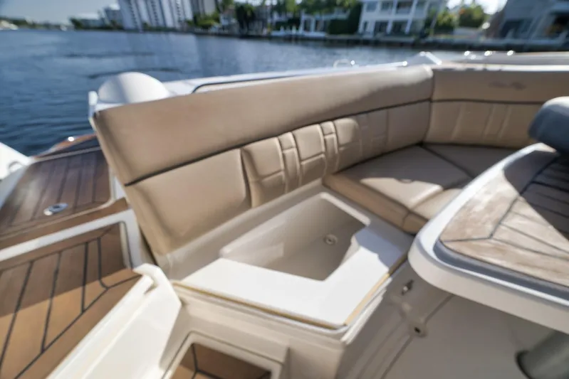  Yacht Photos Pics Luxurious seating area on a 2016 Sea Ray 350 SLX boat, with waterfront view.