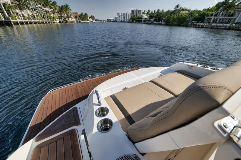  Yacht Photos Pics 2016 Sea Ray 350 SLX boat on a scenic waterway with luxurious seating.