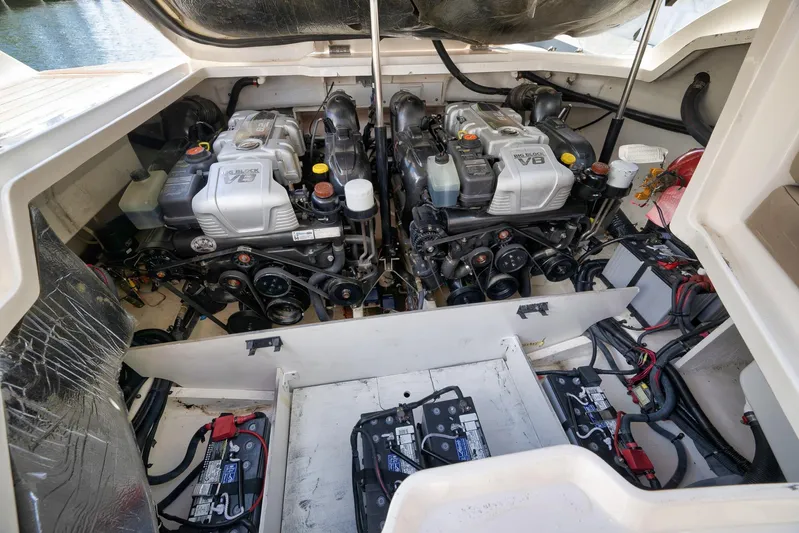  Yacht Photos Pics Engine compartment of a 2016 Sea Ray 350 SLX boat, featuring dual V8 engines.