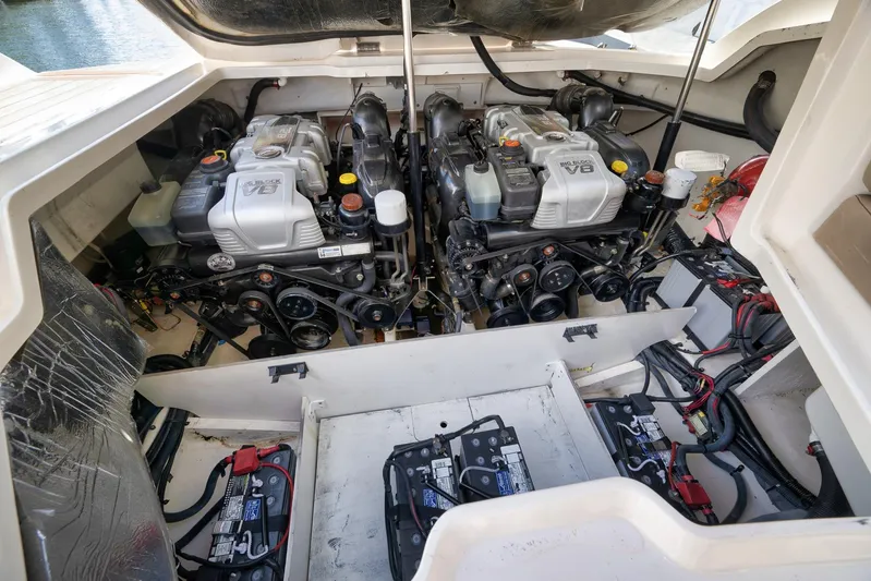  Yacht Photos Pics Engine compartment of a 2016 Sea Ray 350 SLX boat, featuring dual V8 engines.