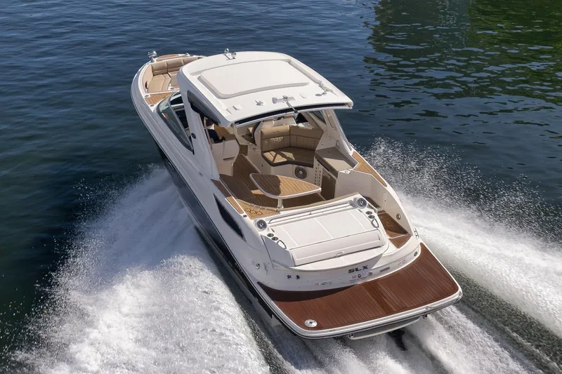  Yacht Photos Pics 2016 Sea Ray 350 SLX cruising on water, showcasing luxury design and performance.