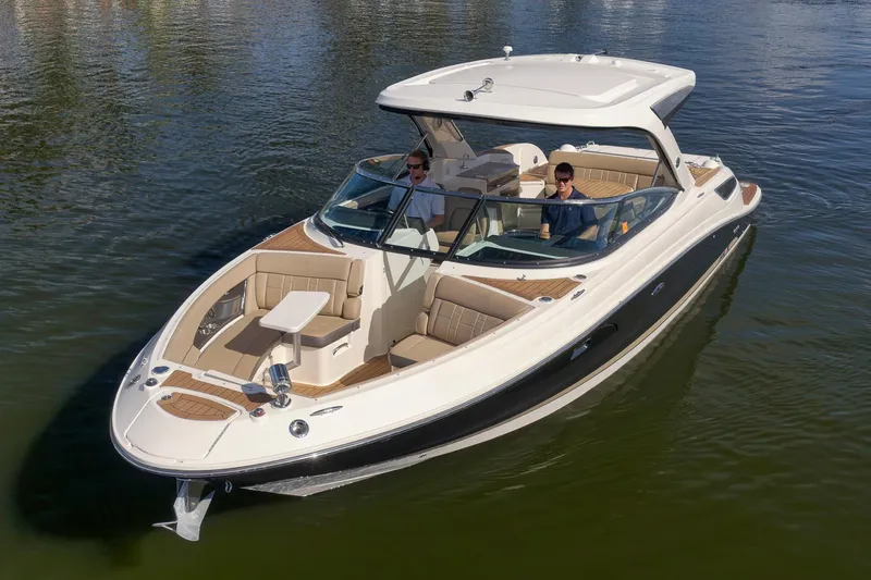  Yacht Photos Pics 2016 Sea Ray 350 SLX luxury boat cruising on calm water.