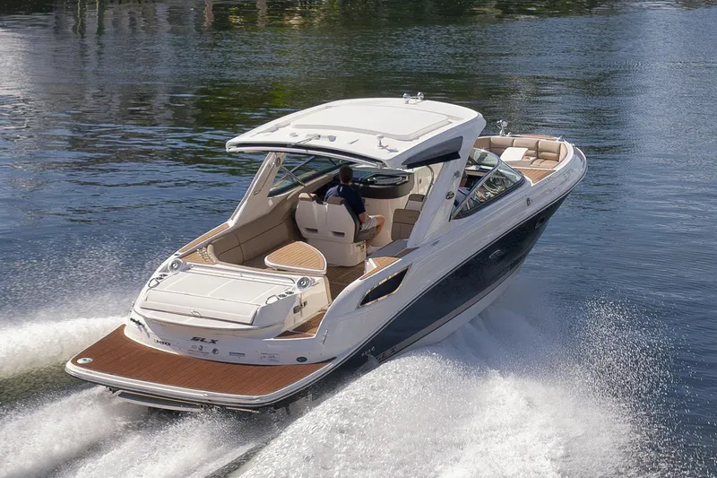  Yacht Photos Pics 2016 Sea Ray 350 SLX cruising on water, showcasing sleek design and luxury features.