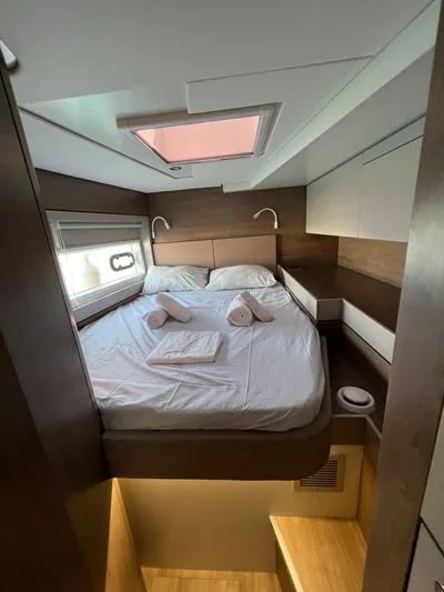  Yacht Photos Pics Cozy bedroom in 2023 Bali 4.6 yacht with skylight and modern design.
