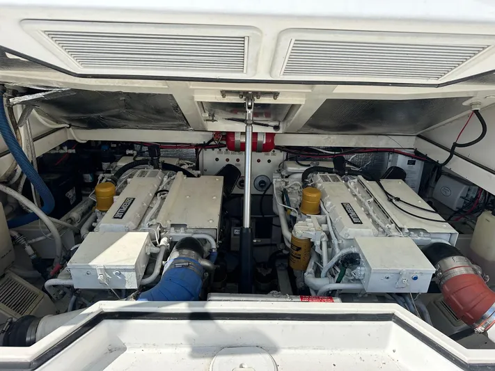  Yacht Photos Pics Engine compartment of 2000 Cabo 31 Express boat, featuring dual engines.