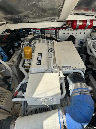  Yacht Photos Pics Engine compartment of a 2000 Cabo 31 Express boat, featuring detailed components.